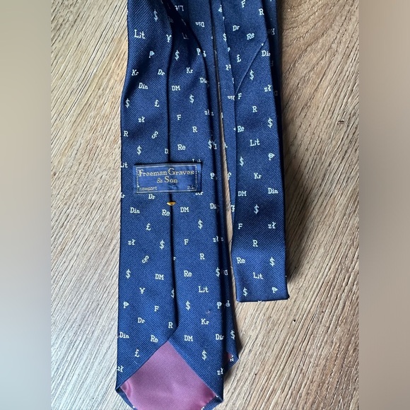 Navy blue Freeman Graves & Son men’s tie with world currency symbols. Skinny tie - Picture 3 of 4
